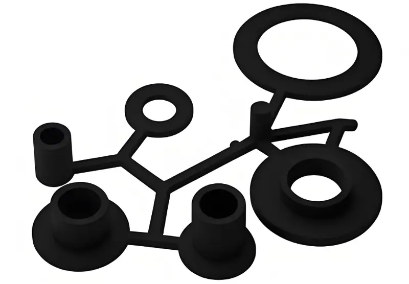 Various black circular shaped injection molded components connected together