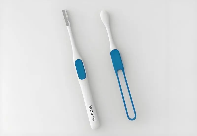 Zwei moderne spritzgegossene Zahnbürsten mit blauen Akzenten auf einer weißen Oberfläche