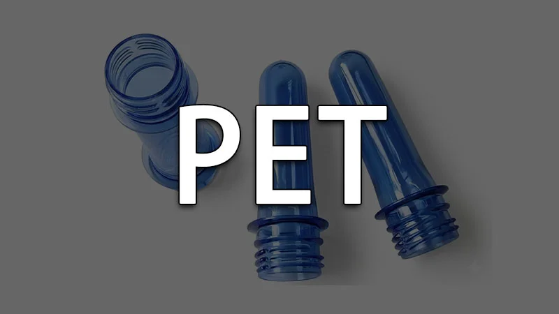 Three blue PET preforms arranged on a grey background showcasing injection molded designs.