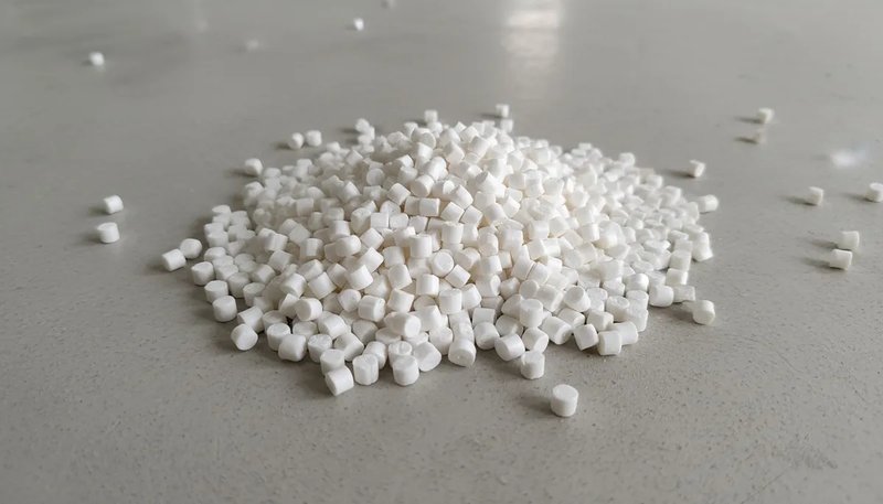 Plastic resin pellets in multiple colors used as raw material for injection molding