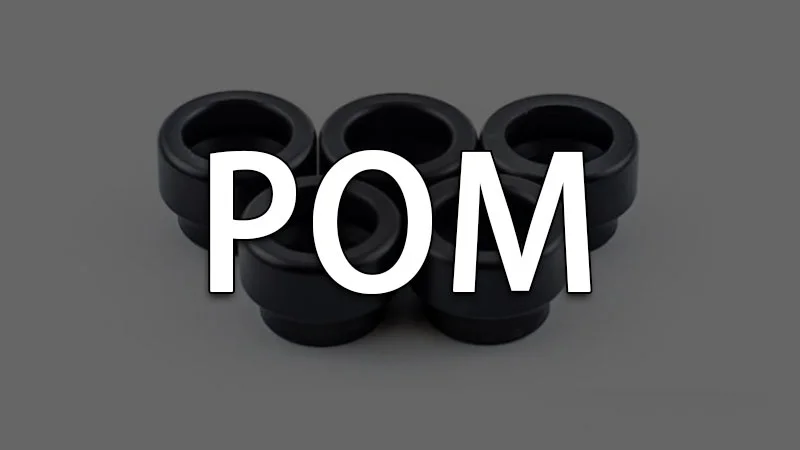 Black POM plastic parts arranged with POM text overlay on gray background.