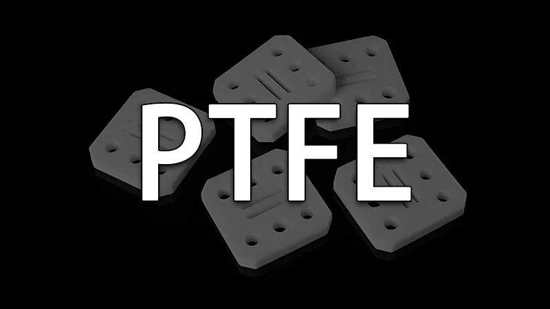 PTFE plastic components with multiple holes, displayed on a black background.