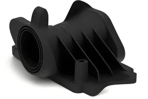 A black plastic automotive component with fins and a circular opening.